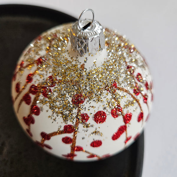 Snow-Covered Rosehips Glass Ornament