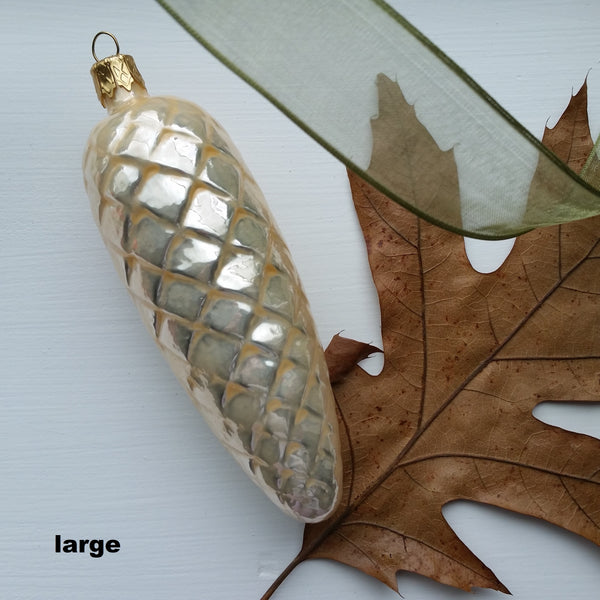 Snow Pine Cone Glass Ornament - Woodland glass ornament handcrafted in Europe, where Old World Christmas ornament making has a long tradition.